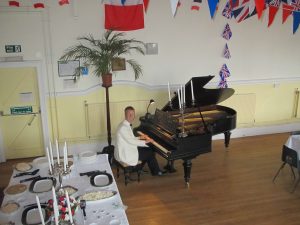 Piano player for hire playing in Bath, Somerset